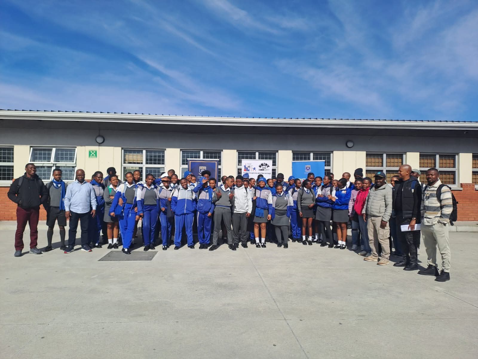 Learners and volunteers at an Amis BK school programme
